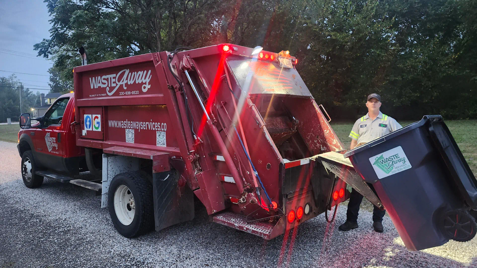 waste collection using a red truck